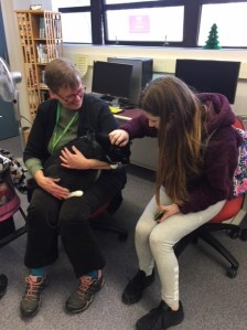 A student visiting with BigBob at Bristol Coummity College Attleboro campus